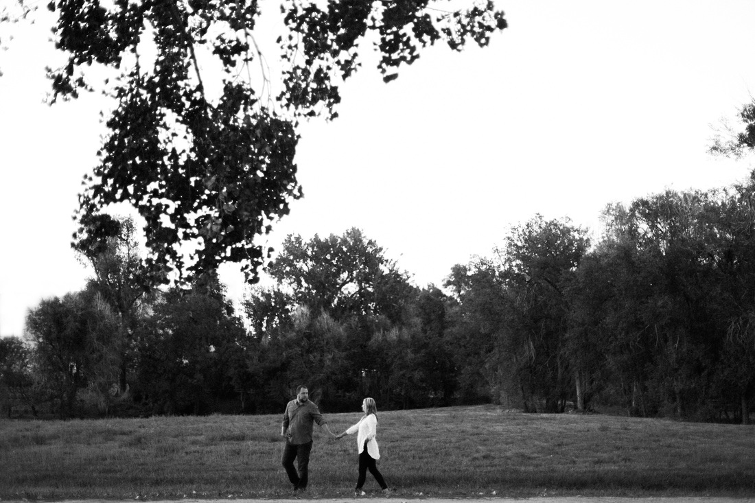 Engagement Photography in Littleton, CO for Shane+Deidre in a Rose Garden with moody Black and White Photographs