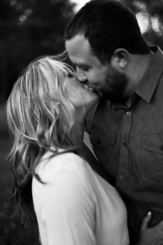 Engagement Photography in Littleton, CO for Shane+Deidre in a Rose Garden with moody Black and White Photographs