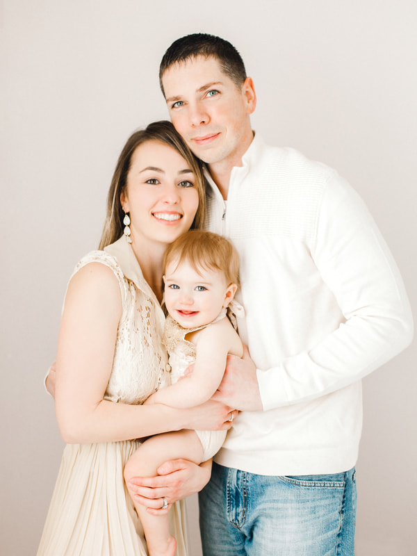 Classic Family Portraits featuring a nuetral color palettte all photographed from one bedroom
